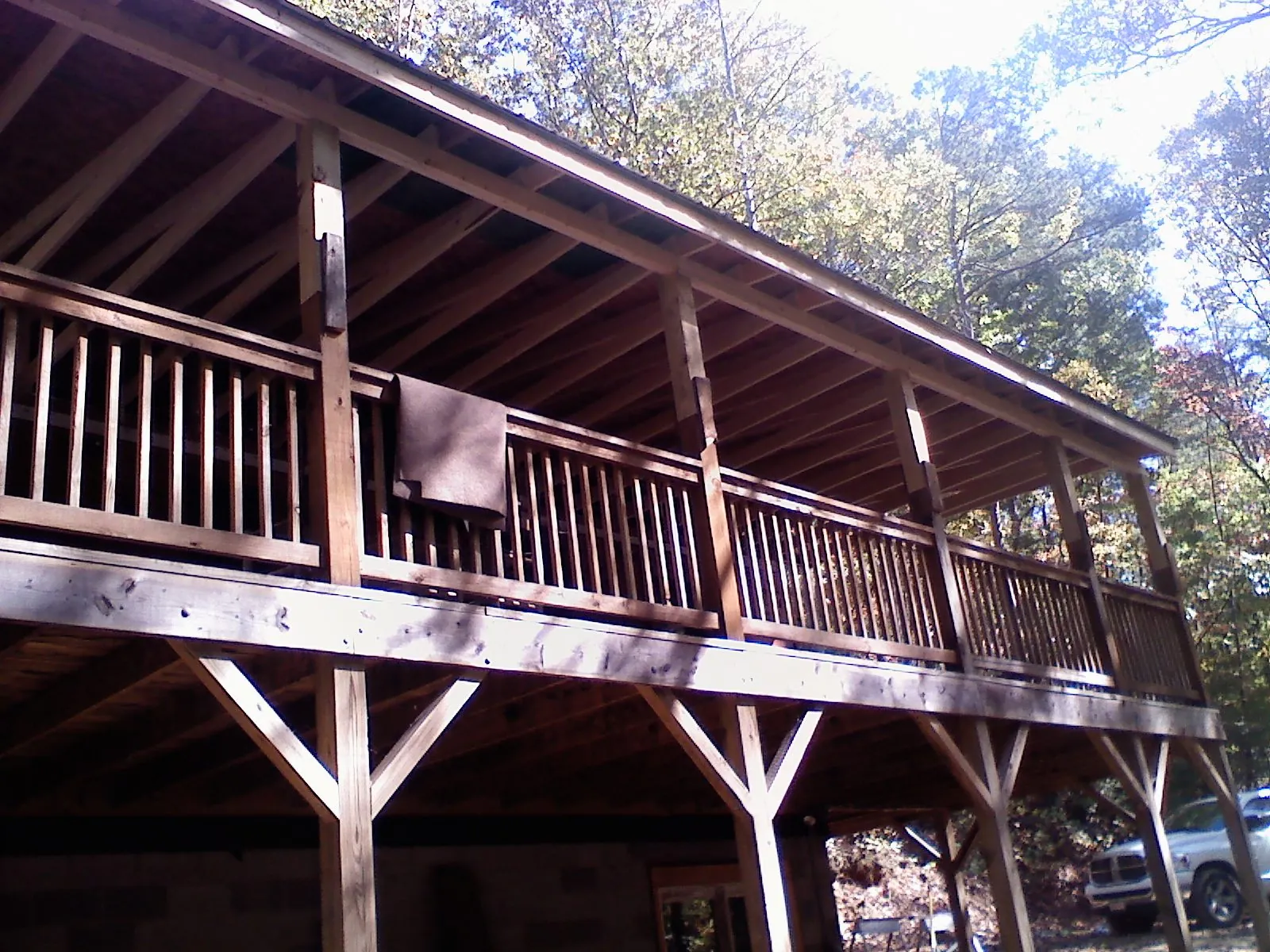 Timber framing under a new elevated porch and deck — Roof Leak Repair in West Townsend by Roofing Brothers